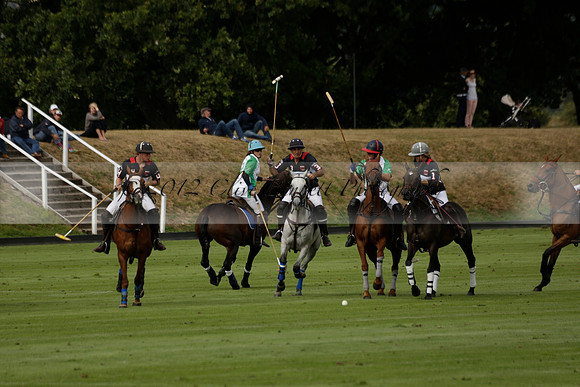 Jaeger Le Coultre (black)  v Wairakei Pastoral (white) in a Jaeger Le Coultre Holden White Cup polo match played on 29 July 2013 at Cowdray Park Polo Club on Brooksfieldwww.polopictures.co.uk