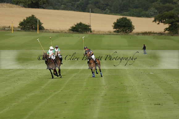Jaeger Le Coultre (black)  v Wairakei Pastoral (white) in a Jaeger Le Coultre Holden White Cup polo match played on 29 July 2013 at Cowdray Park Polo Club on Brooksfieldwww.polopictures.co.uk