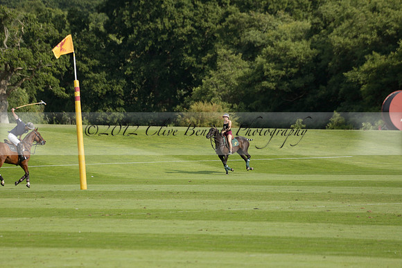 Pandas (white) v Home Farm (navy) in a Park House West Sussex Cup Polo match on Brooksfield at Cowdray Park Polo Club on Friday 30 August 2013. 2013.08.30 www.polopictures.co.uk