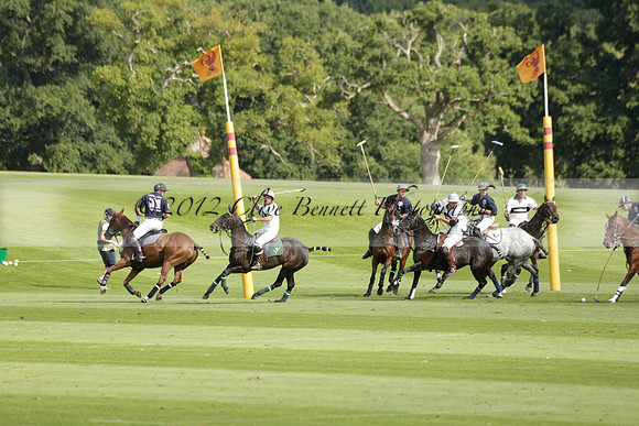 Pandas (white) v Home Farm (navy) in a Park House West Sussex Cup Polo match on Brooksfield at Cowdray Park Polo Club on Friday 30 August 2013. 2013.08.30 www.polopictures.co.uk