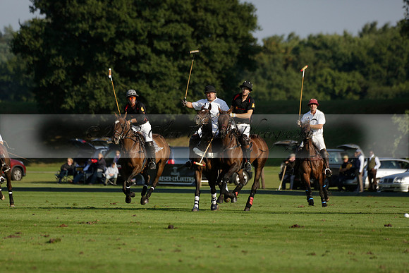 Pluma Negra (white) v Shoreline (black) in the Brecknock Cup Subsidiary final polo match played on Sunday 25 August 2013 at Cowdray Park Polo Club on Ambersham 1. 2013.10.12 www.polopictures.co.uk