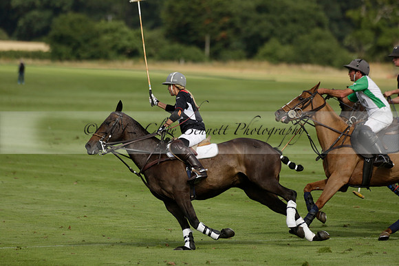 Jaeger Le Coultre (black)  v Wairakei Pastoral (white) in a Jaeger Le Coultre Holden White Cup polo match played on 29 July 2013 at Cowdray Park Polo Club on Brooksfieldwww.polopictures.co.uk