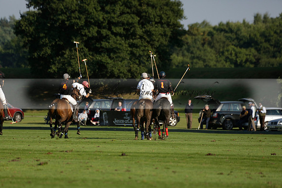 Pluma Negra (white) v Shoreline (black) in the Brecknock Cup Subsidiary final polo match played on Sunday 25 August 2013 at Cowdray Park Polo Club on Ambersham 1. 2013.10.12 www.polopictures.co.uk