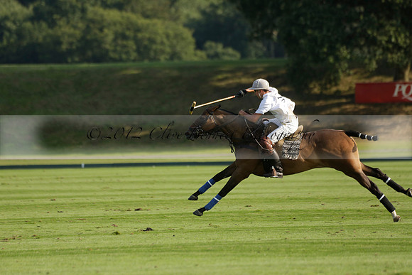 Pluma Negra (white) v Shoreline (black) in the Brecknock Cup Subsidiary final polo match played on Sunday 25 August 2013 at Cowdray Park Polo Club on Ambersham 1. 2013.10.12 www.polopictures.co.uk