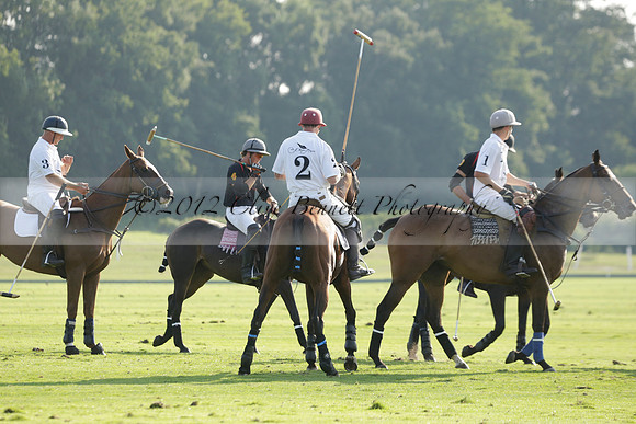 Pluma Negra (white) v Shoreline (black) in the Brecknock Cup Subsidiary final polo match played on Sunday 25 August 2013 at Cowdray Park Polo Club on Ambersham 1. 2013.10.12 www.polopictures.co.uk