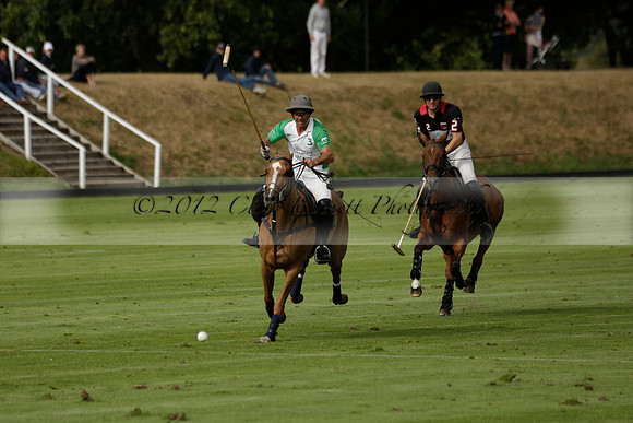 Jaeger Le Coultre (black)  v Wairakei Pastoral (white) in a Jaeger Le Coultre Holden White Cup polo match played on 29 July 2013 at Cowdray Park Polo Club on Brooksfieldwww.polopictures.co.uk