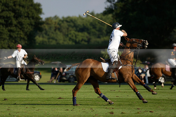 Pluma Negra (white) v Shoreline (black) in the Brecknock Cup Subsidiary final polo match played on Sunday 25 August 2013 at Cowdray Park Polo Club on Ambersham 1. 2013.10.12 www.polopictures.co.uk