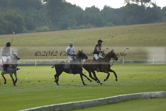 Pluma Negra (white) v Shoreline (black) in the Brecknock Cup Subsidiary final polo match played on Sunday 25 August 2013 at Cowdray Park Polo Club on Ambersham 1. 2013.10.12 www.polopictures.co.uk
