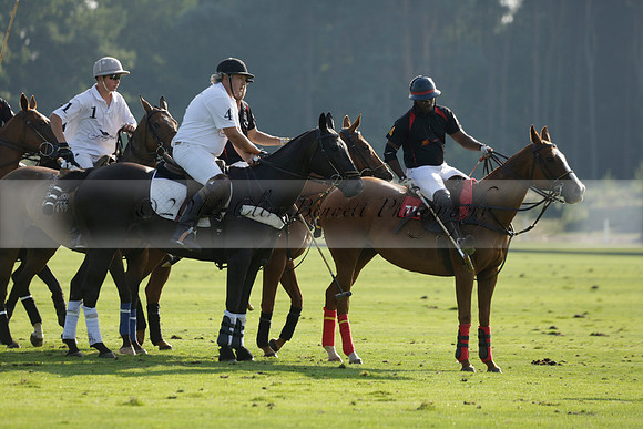 Pluma Negra (white) v Shoreline (black) in the Brecknock Cup Subsidiary final polo match played on Sunday 25 August 2013 at Cowdray Park Polo Club on Ambersham 1. 2013.10.12 www.polopictures.co.uk