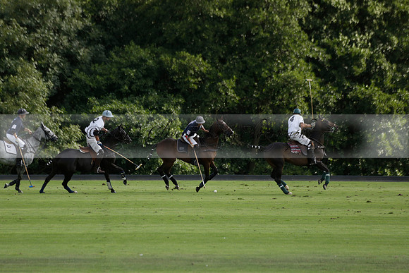 Pandas (white) v Home Farm (navy) in a Park House West Sussex Cup Polo match on Brooksfield at Cowdray Park Polo Club on Friday 30 August 2013. 2013.08.30 www.polopictures.co.uk