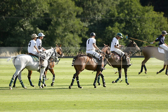 Pandas (white) v Home Farm (navy) in a Park House West Sussex Cup Polo match on Brooksfield at Cowdray Park Polo Club on Friday 30 August 2013. 2013.08.30 www.polopictures.co.uk