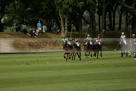 Jaeger Le Coultre (black)  v Wairakei Pastoral (white) in a Jaeger Le Coultre Holden White Cup polo match played on 29 July 2013 at Cowdray Park Polo Club on Brooksfieldwww.polopictures.co.uk