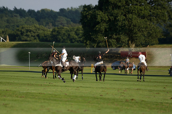 Pluma Negra (white) v Shoreline (black) in the Brecknock Cup Subsidiary final polo match played on Sunday 25 August 2013 at Cowdray Park Polo Club on Ambersham 1. 2013.10.12 www.polopictures.co.uk