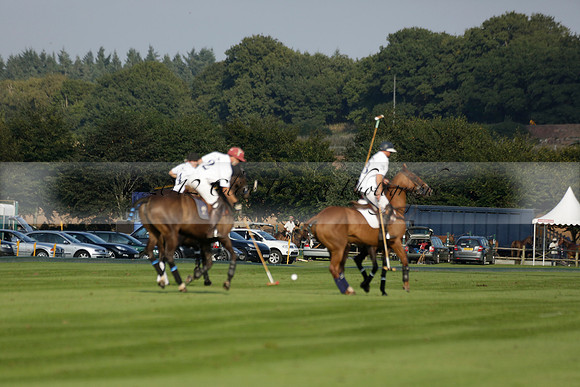 Pluma Negra (white) v Shoreline (black) in the Brecknock Cup Subsidiary final polo match played on Sunday 25 August 2013 at Cowdray Park Polo Club on Ambersham 1. 2013.10.12 www.polopictures.co.uk