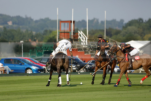 Pluma Negra (white) v Shoreline (black) in the Brecknock Cup Subsidiary final polo match played on Sunday 25 August 2013 at Cowdray Park Polo Club on Ambersham 1. 2013.10.12 www.polopictures.co.uk