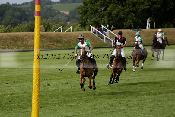 Jaeger Le Coultre (black)  v Wairakei Pastoral (white) in a Jaeger Le Coultre Holden White Cup polo match played on 29 July 2013 at Cowdray Park Polo Club on Brooksfieldwww.polopictures.co.uk