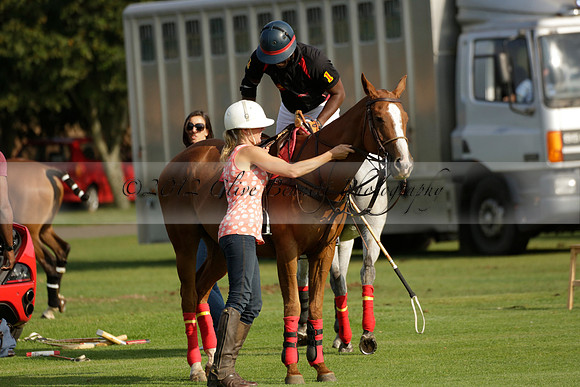 Pluma Negra (white) v Shoreline (black) in the Brecknock Cup Subsidiary final polo match played on Sunday 25 August 2013 at Cowdray Park Polo Club on Ambersham 1. 2013.10.12 www.polopictures.co.uk