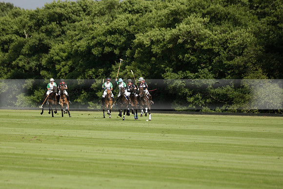 Jaeger Le Coultre (black)  v Wairakei Pastoral (white) in a Jaeger Le Coultre Holden White Cup polo match played on 29 July 2013 at Cowdray Park Polo Club on Brooksfieldwww.polopictures.co.uk