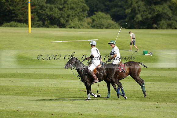 Pandas (white) v Home Farm (navy) in a Park House West Sussex Cup Polo match on Brooksfield at Cowdray Park Polo Club on Friday 30 August 2013. 2013.08.30 www.polopictures.co.uk