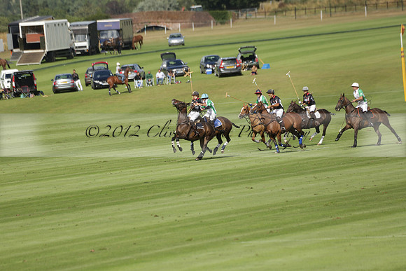 Jaeger Le Coultre (black)  v Wairakei Pastoral (white) in a Jaeger Le Coultre Holden White Cup polo match played on 29 July 2013 at Cowdray Park Polo Club on Brooksfieldwww.polopictures.co.uk