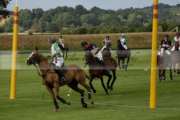 Jaeger Le Coultre (black)  v Wairakei Pastoral (white) in a Jaeger Le Coultre Holden White Cup polo match played on 29 July 2013 at Cowdray Park Polo Club on Brooksfieldwww.polopictures.co.uk