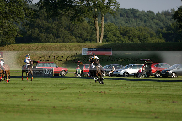 Pluma Negra (white) v Shoreline (black) in the Brecknock Cup Subsidiary final polo match played on Sunday 25 August 2013 at Cowdray Park Polo Club on Ambersham 1. 2013.10.12 www.polopictures.co.uk