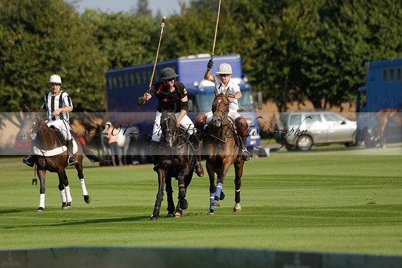 Pluma Negra (white) v Shoreline (black) in the Brecknock Cup Subsidiary final polo match played on Sunday 25 August 2013 at Cowdray Park Polo Club on Ambersham 1. 2013.10.12 www.polopictures.co.uk