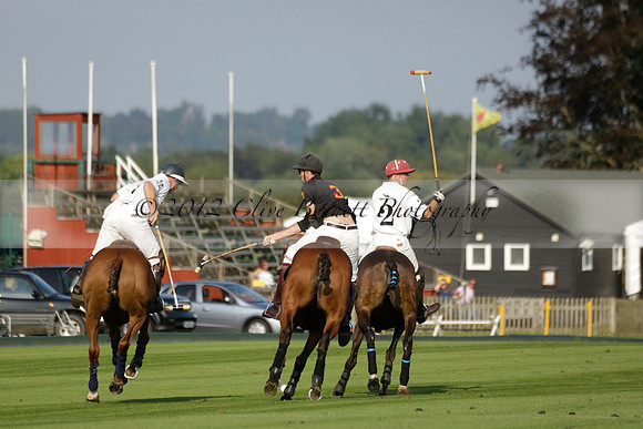 Pluma Negra (white) v Shoreline (black) in the Brecknock Cup Subsidiary final polo match played on Sunday 25 August 2013 at Cowdray Park Polo Club on Ambersham 1. 2013.10.12 www.polopictures.co.uk