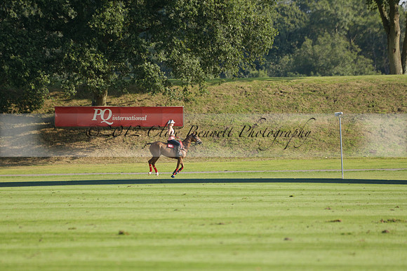 Pluma Negra (white) v Shoreline (black) in the Brecknock Cup Subsidiary final polo match played on Sunday 25 August 2013 at Cowdray Park Polo Club on Ambersham 1. 2013.10.12 www.polopictures.co.uk