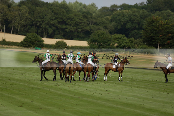 Jaeger Le Coultre (black)  v Wairakei Pastoral (white) in a Jaeger Le Coultre Holden White Cup polo match played on 29 July 2013 at Cowdray Park Polo Club on Brooksfieldwww.polopictures.co.uk
