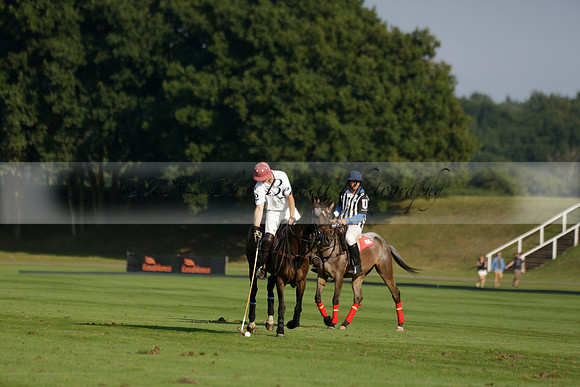 Pluma Negra (white) v Shoreline (black) in the Brecknock Cup Subsidiary final polo match played on Sunday 25 August 2013 at Cowdray Park Polo Club on Ambersham 1. 2013.10.12 www.polopictures.co.uk