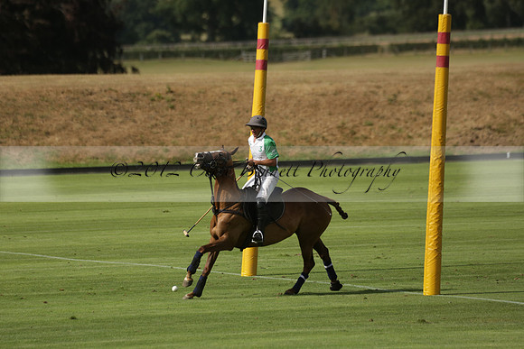 Jaeger Le Coultre (black)  v Wairakei Pastoral (white) in a Jaeger Le Coultre Holden White Cup polo match played on 29 July 2013 at Cowdray Park Polo Club on Brooksfieldwww.polopictures.co.uk