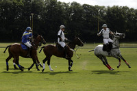 Combe Place (blue) v Silver Fox (white) in a Park House West Sussex Cup Polo match on Ambersham 1 at Cowdray Park Polo Club on Friday 30 August 2013. 2013.08.30 www.polopictures.co.uk