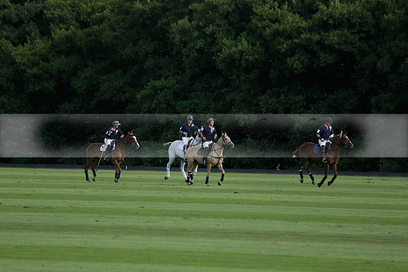 Pandas (white) v Home Farm (navy) in a Park House West Sussex Cup Polo match on Brooksfield at Cowdray Park Polo Club on Friday 30 August 2013. 2013.08.30 www.polopictures.co.uk
