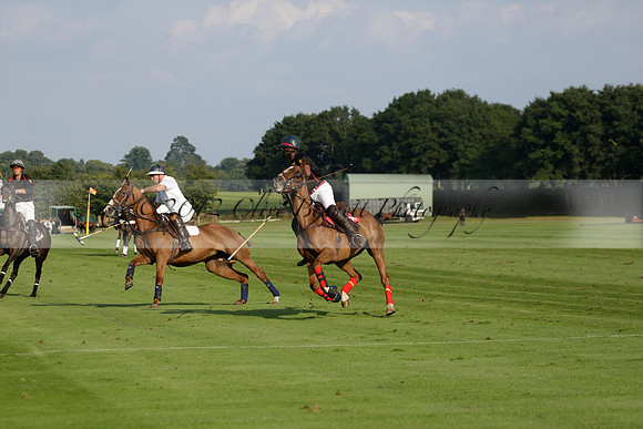 Pluma Negra (white) v Shoreline (black) in the Brecknock Cup Subsidiary final polo match played on Sunday 25 August 2013 at Cowdray Park Polo Club on Ambersham 1. 2013.10.12 www.polopictures.co.uk