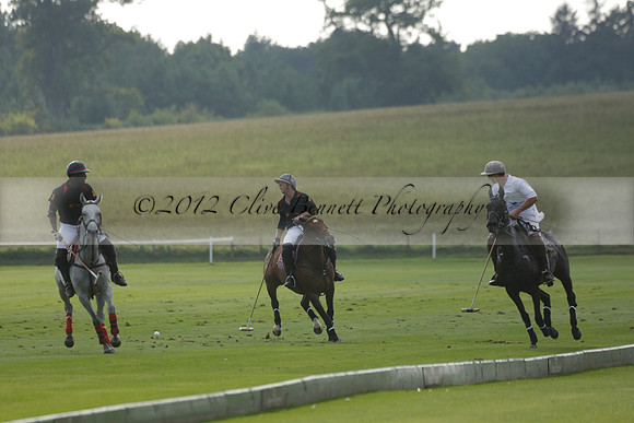 Pluma Negra (white) v Shoreline (black) in the Brecknock Cup Subsidiary final polo match played on Sunday 25 August 2013 at Cowdray Park Polo Club on Ambersham 1. 2013.10.12 www.polopictures.co.uk