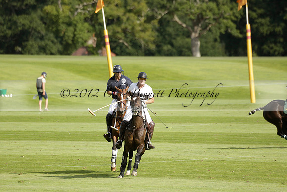 Pandas (white) v Home Farm (navy) in a Park House West Sussex Cup Polo match on Brooksfield at Cowdray Park Polo Club on Friday 30 August 2013. 2013.08.30 www.polopictures.co.uk