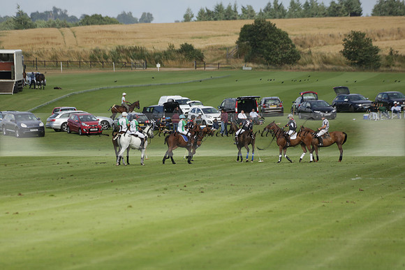 Jaeger Le Coultre (black)  v Wairakei Pastoral (white) in a Jaeger Le Coultre Holden White Cup polo match played on 29 July 2013 at Cowdray Park Polo Club on Brooksfieldwww.polopictures.co.uk