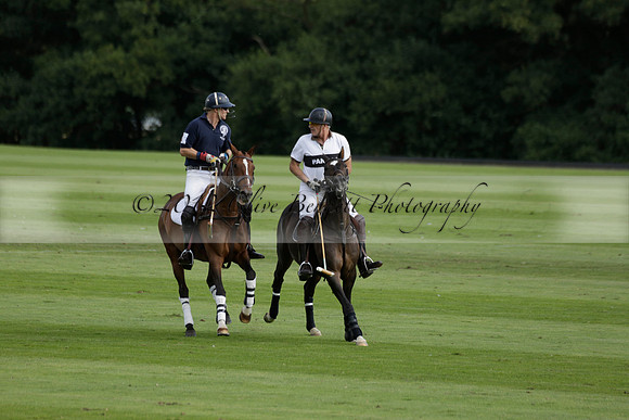 Pandas (white) v Home Farm (navy) in a Park House West Sussex Cup Polo match on Brooksfield at Cowdray Park Polo Club on Friday 30 August 2013. 2013.08.30 www.polopictures.co.uk