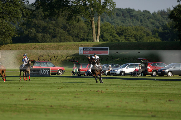 Pluma Negra (white) v Shoreline (black) in the Brecknock Cup Subsidiary final polo match played on Sunday 25 August 2013 at Cowdray Park Polo Club on Ambersham 1. 2013.10.12 www.polopictures.co.uk