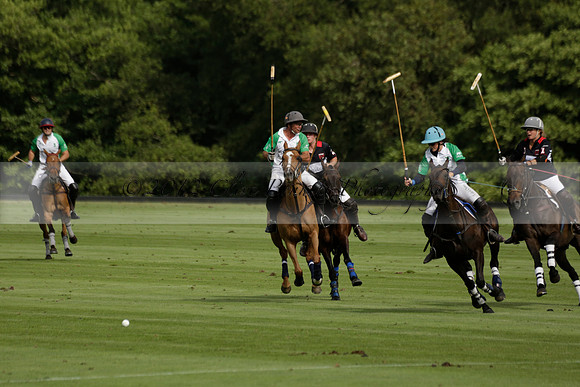 Jaeger Le Coultre (black)  v Wairakei Pastoral (white) in a Jaeger Le Coultre Holden White Cup polo match played on 29 July 2013 at Cowdray Park Polo Club on Brooksfieldwww.polopictures.co.uk