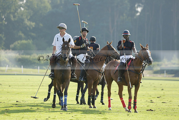 Pluma Negra (white) v Shoreline (black) in the Brecknock Cup Subsidiary final polo match played on Sunday 25 August 2013 at Cowdray Park Polo Club on Ambersham 1. 2013.10.12 www.polopictures.co.uk
