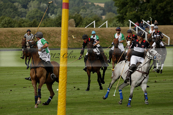 Jaeger Le Coultre (black)  v Wairakei Pastoral (white) in a Jaeger Le Coultre Holden White Cup polo match played on 29 July 2013 at Cowdray Park Polo Club on Brooksfieldwww.polopictures.co.uk