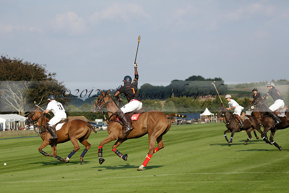 Pluma Negra (white) v Shoreline (black) in the Brecknock Cup Subsidiary final polo match played on Sunday 25 August 2013 at Cowdray Park Polo Club on Ambersham 1. 2013.10.12 www.polopictures.co.uk