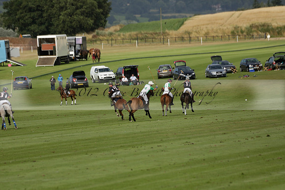 Jaeger Le Coultre (black)  v Wairakei Pastoral (white) in a Jaeger Le Coultre Holden White Cup polo match played on 29 July 2013 at Cowdray Park Polo Club on Brooksfieldwww.polopictures.co.uk