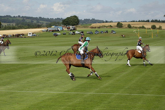 Jaeger Le Coultre (black)  v Wairakei Pastoral (white) in a Jaeger Le Coultre Holden White Cup polo match played on 29 July 2013 at Cowdray Park Polo Club on Brooksfieldwww.polopictures.co.uk