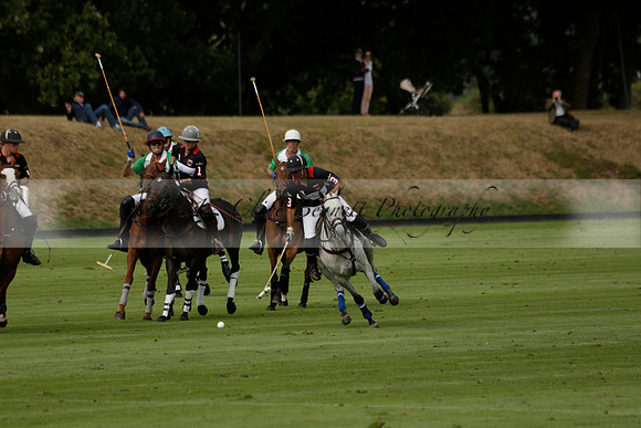 Jaeger Le Coultre (black)  v Wairakei Pastoral (white) in a Jaeger Le Coultre Holden White Cup polo match played on 29 July 2013 at Cowdray Park Polo Club on Brooksfieldwww.polopictures.co.uk