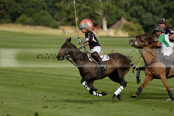 Jaeger Le Coultre (black)  v Wairakei Pastoral (white) in a Jaeger Le Coultre Holden White Cup polo match played on 29 July 2013 at Cowdray Park Polo Club on Brooksfieldwww.polopictures.co.uk