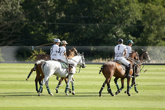 Pandas (white) v Home Farm (navy) in a Park House West Sussex Cup Polo match on Brooksfield at Cowdray Park Polo Club on Friday 30 August 2013. 2013.08.30 www.polopictures.co.uk