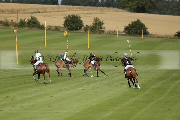 Jaeger Le Coultre (black)  v Wairakei Pastoral (white) in a Jaeger Le Coultre Holden White Cup polo match played on 29 July 2013 at Cowdray Park Polo Club on Brooksfieldwww.polopictures.co.uk